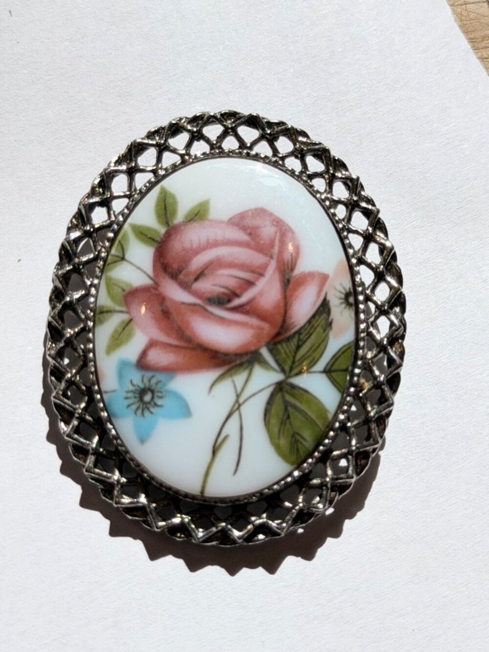 Vintage Porcelain Rose Brooch With Filigree Silver-Tone Frame
